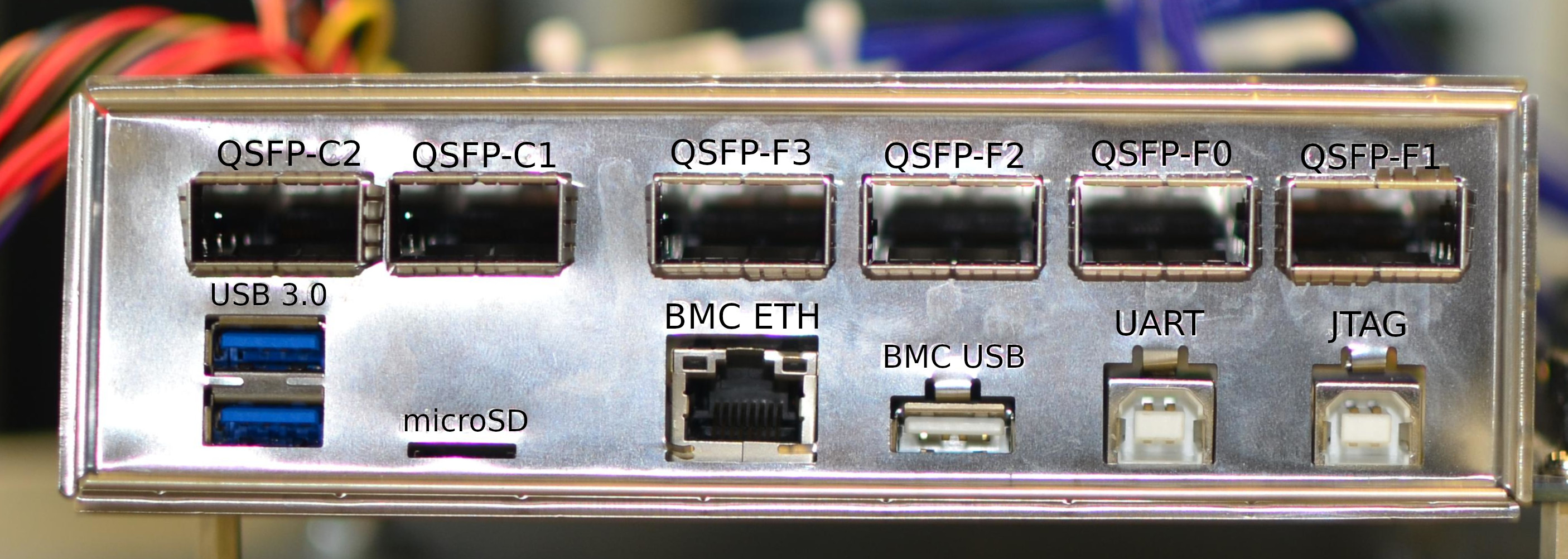 Labeled IO ports on the Enzian's rear panel