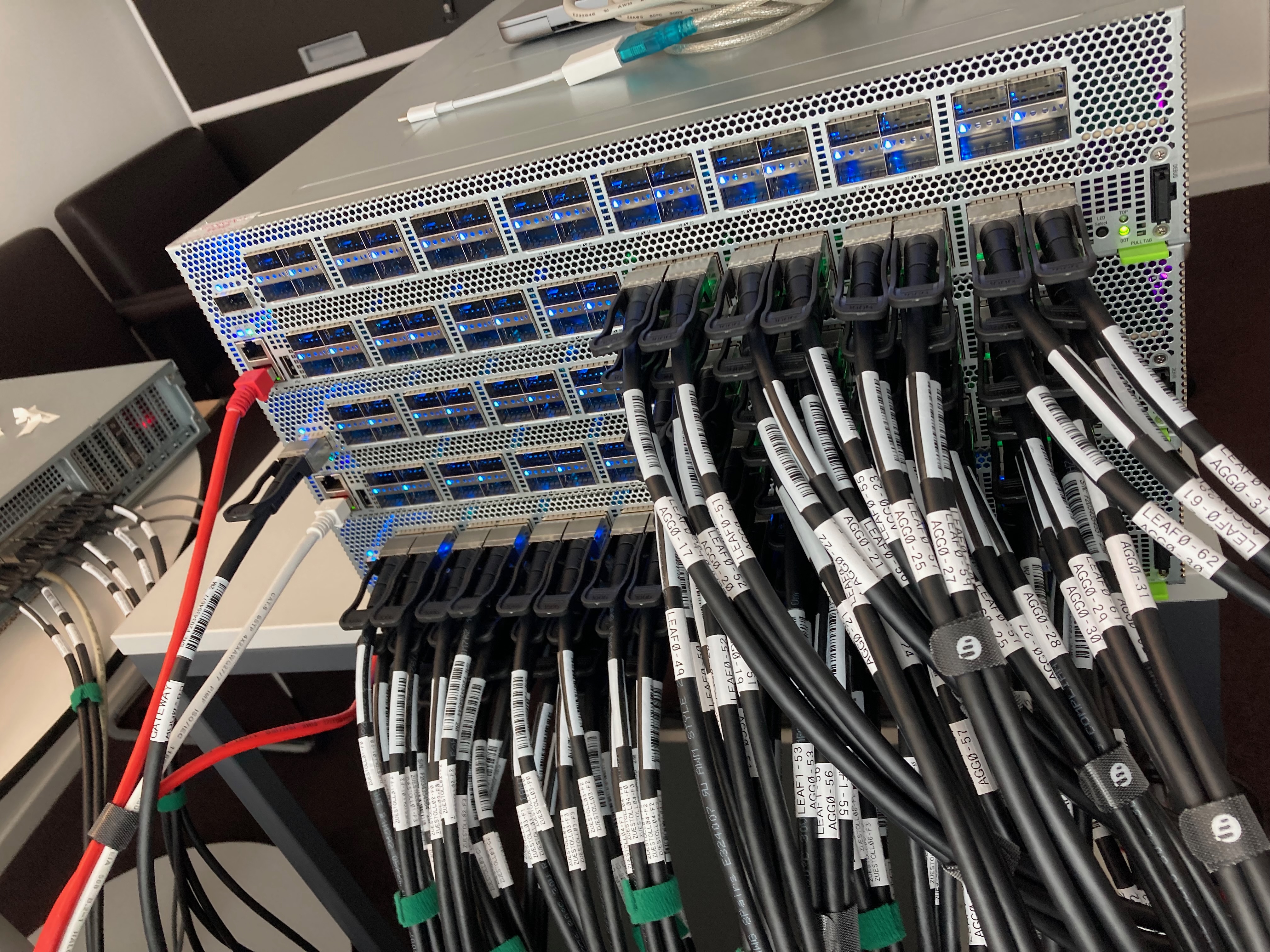 Our three 100G switches connected in our temporary server room