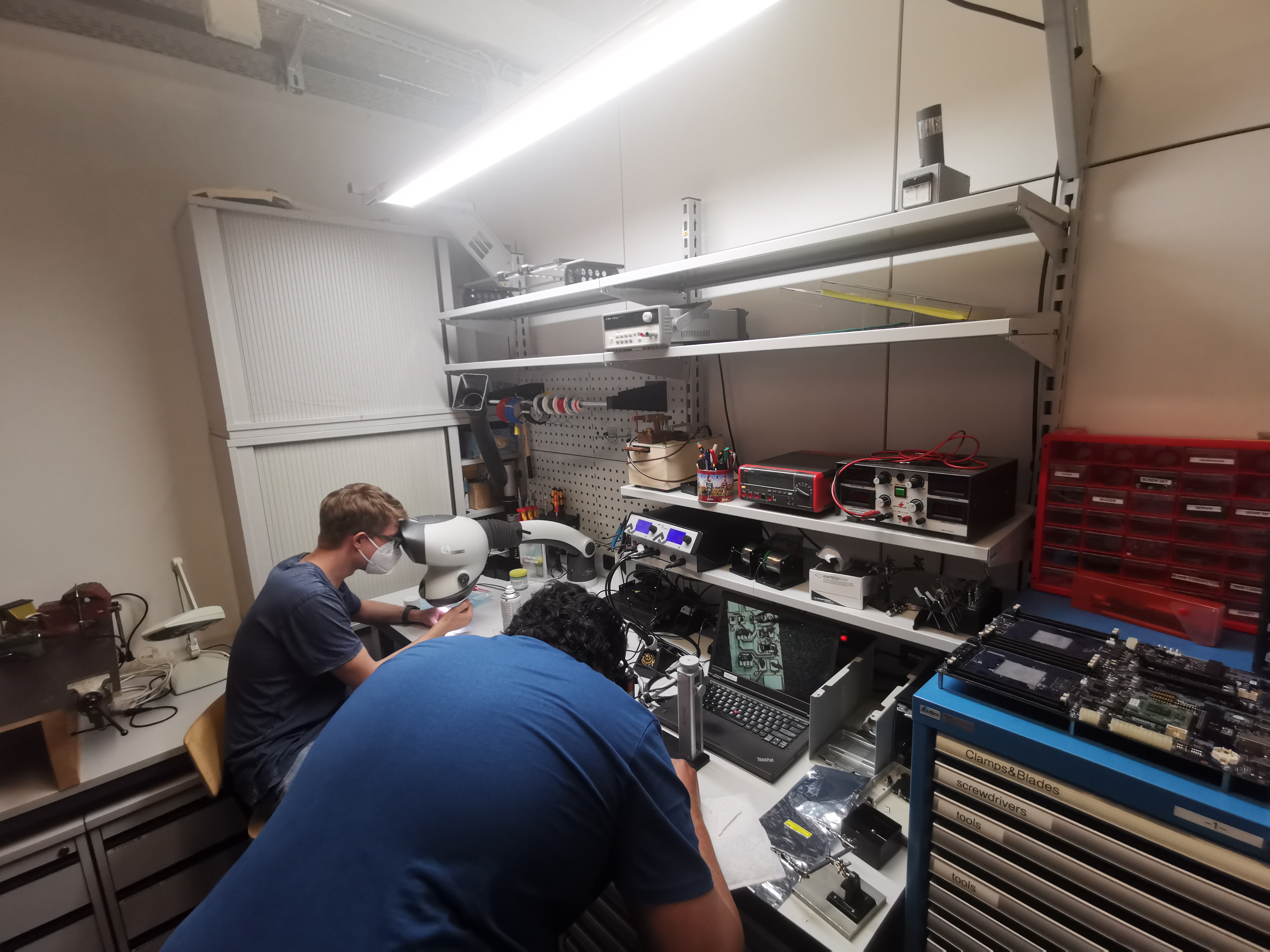 Ben (l) and Abishek (r) assembling and hot air soldering the PCBs